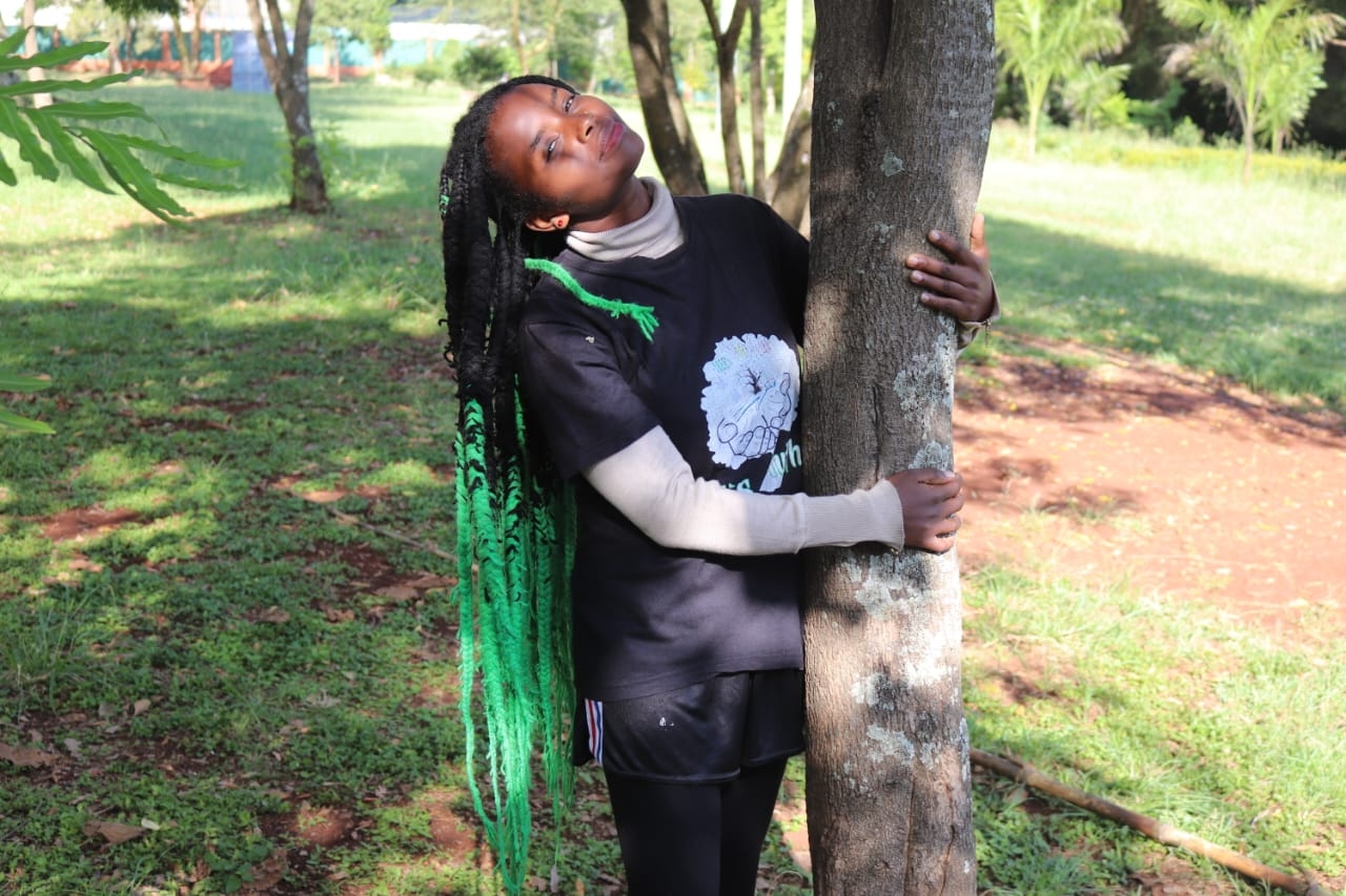 Truphena Muthoni breaks Guinness World Record for longest tree-hugging marathon