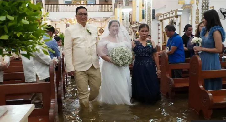 Why Filipino couples marry in flooded churches