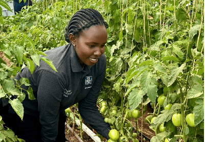 The farm girl sowing seeds of prosperity