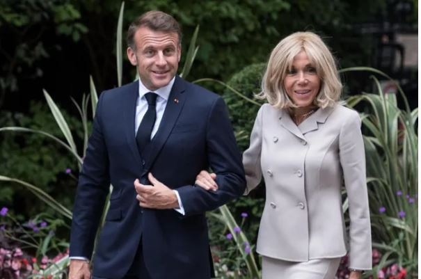 Macron to offer 'evidence' to prove wife's a woman