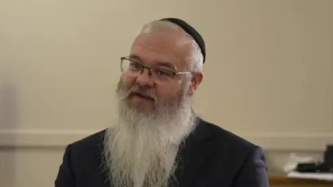 Rabbi: I saw evil as attacker tried to barge into synagogue