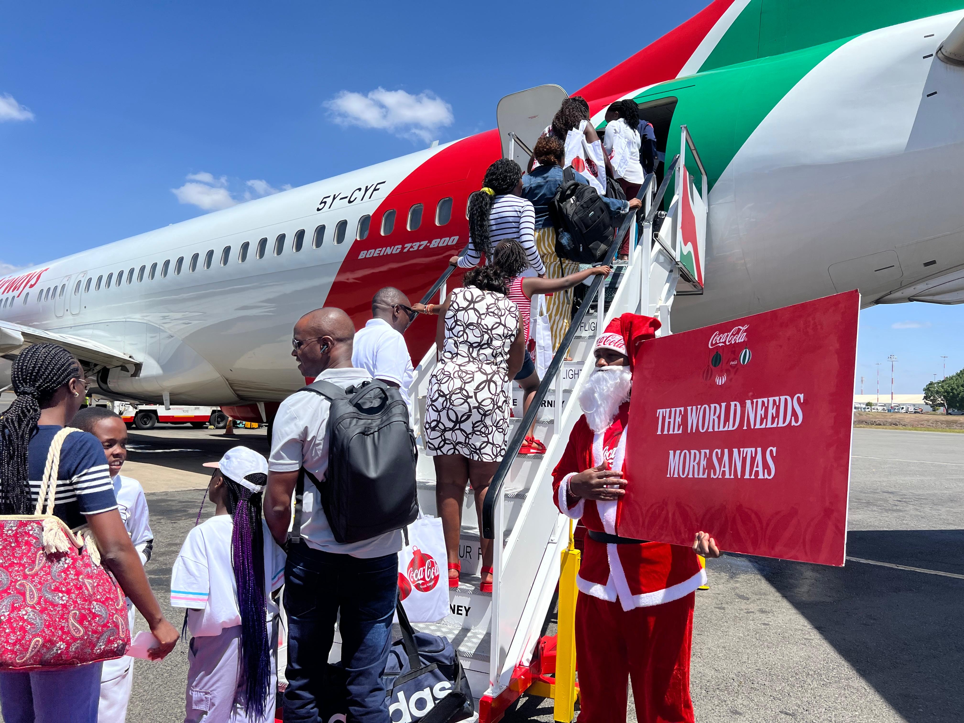 KQ, Coca-Cola bring early festive joy to travellers