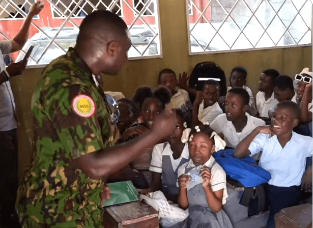 Kenyan police interact with children in Haiti, teach them ‘Swahili’ songs