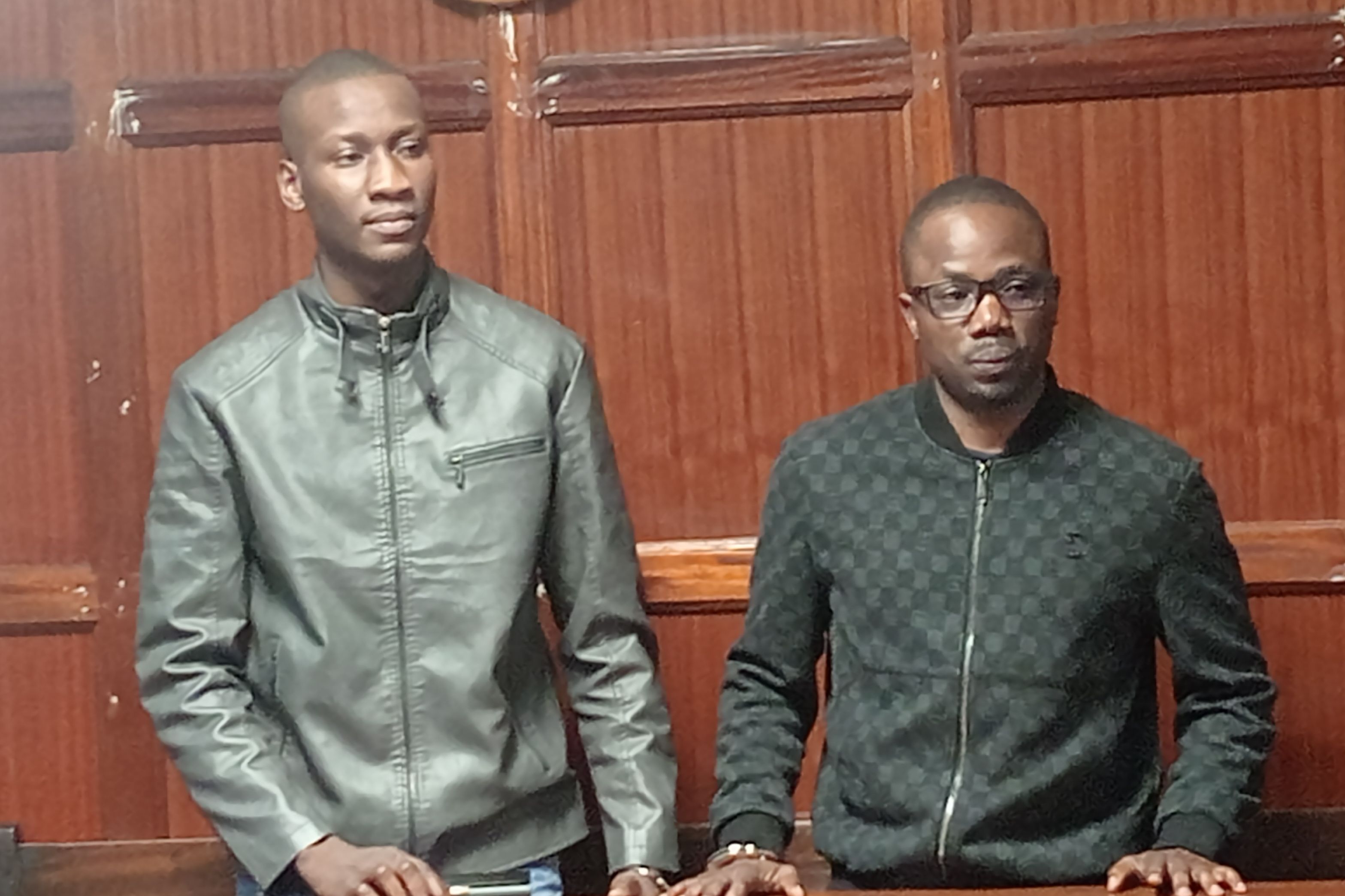 Two men remanded as court awaits pre-bail report in alleged fraud case